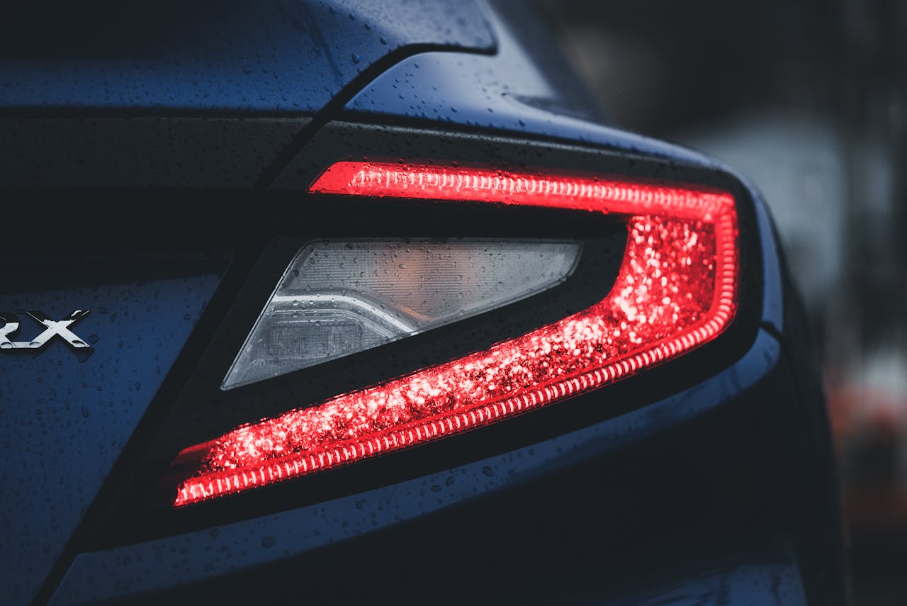 Photo by Erik Mclean: https://www.pexels.com/photo/close-up-of-the-tail-light-in-a-blue-subaru-wrx-16685593/