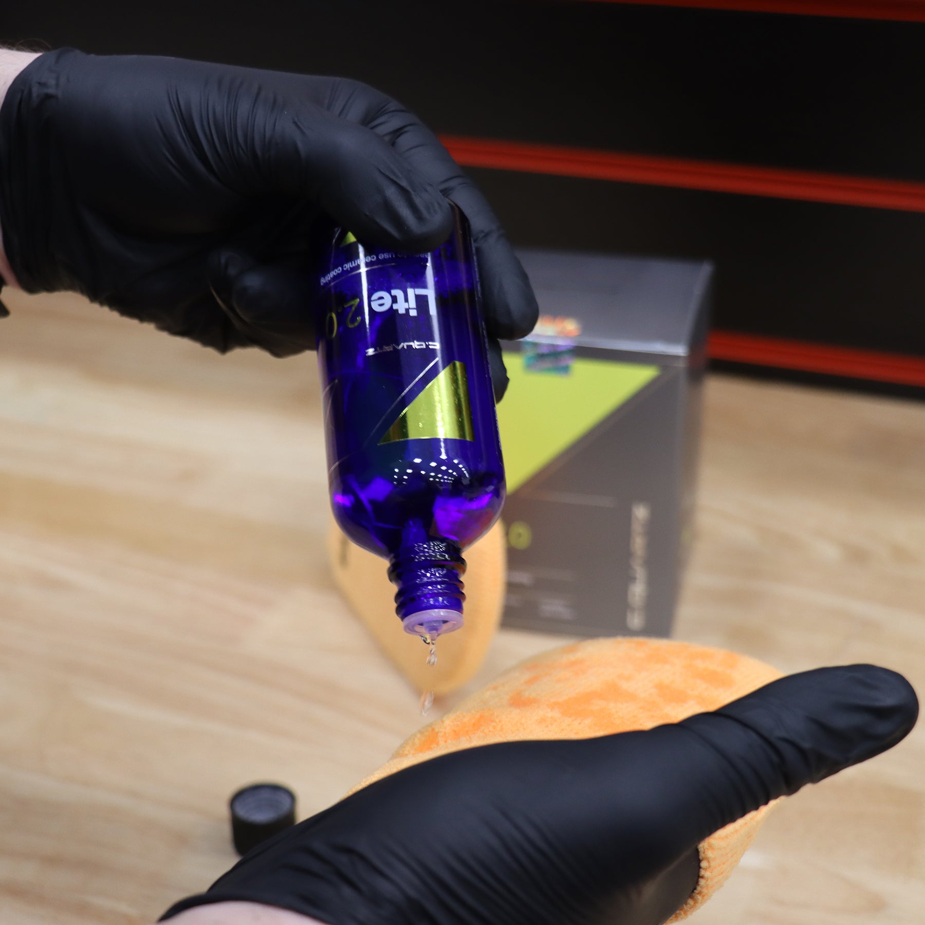 CarPro CQuartz Lite 2.0 being applied to an applicator pad