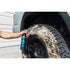 Armour Detail Supply Tyre Cleaner foaming on a car tyre sidewall