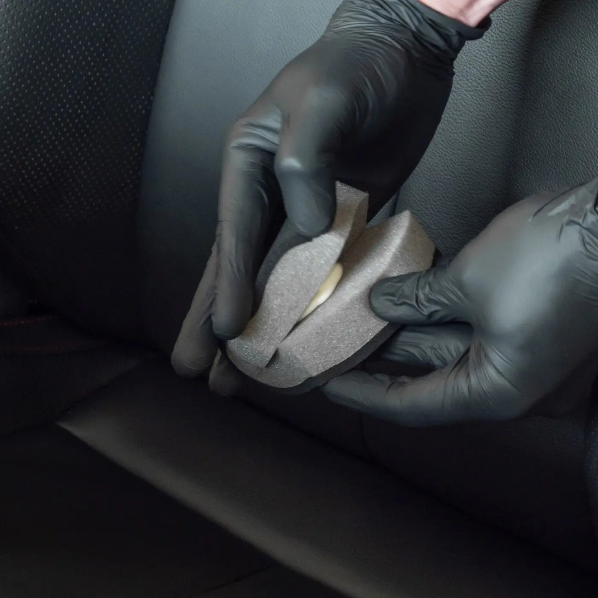 Autoglym Leather Care Balm worked into a leather car seat