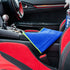 Waffle glass cloth cleaning an interior infotainment screen