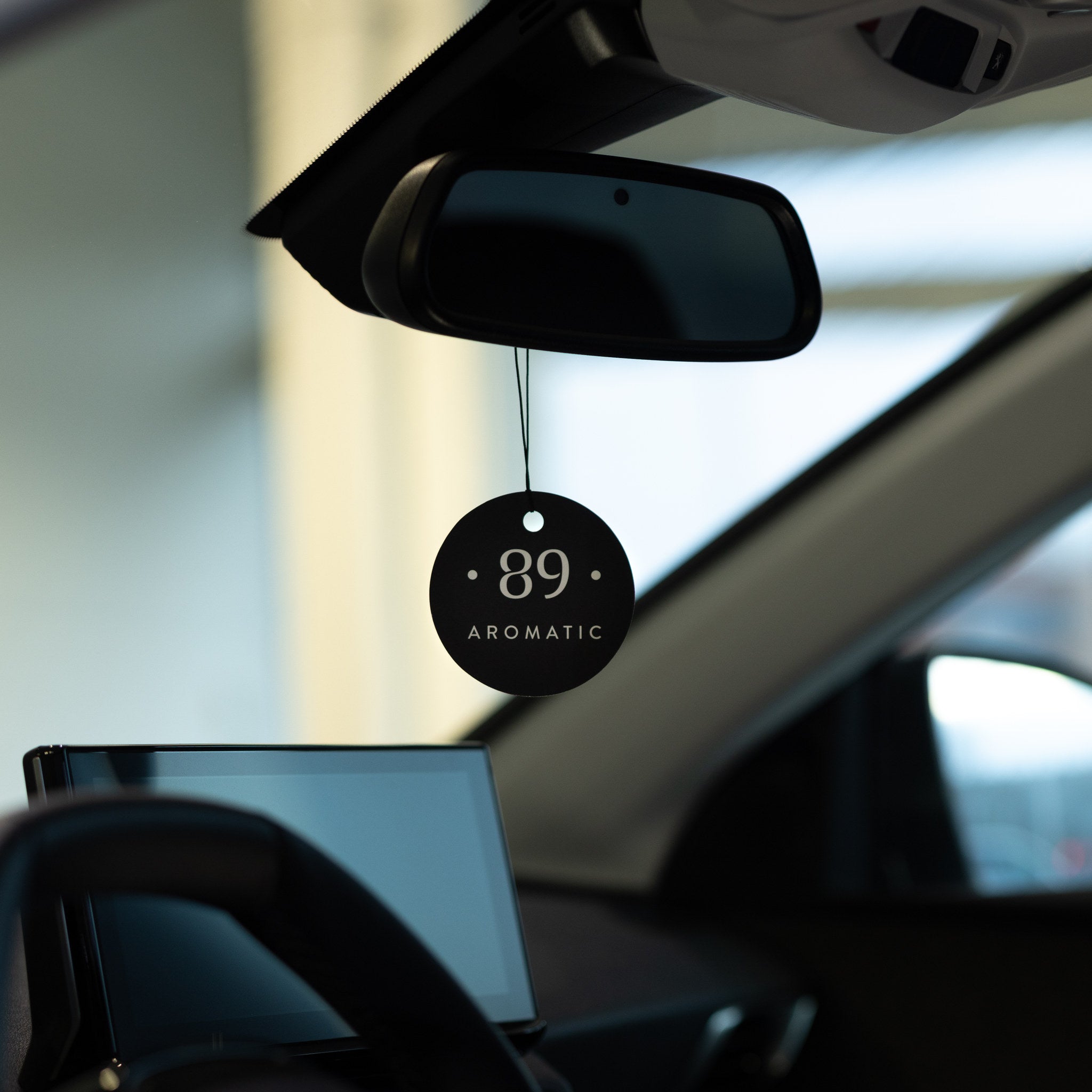 Aromatic 89 Hanging Paper Car Air Freshener, card hanging from rear-view mirror