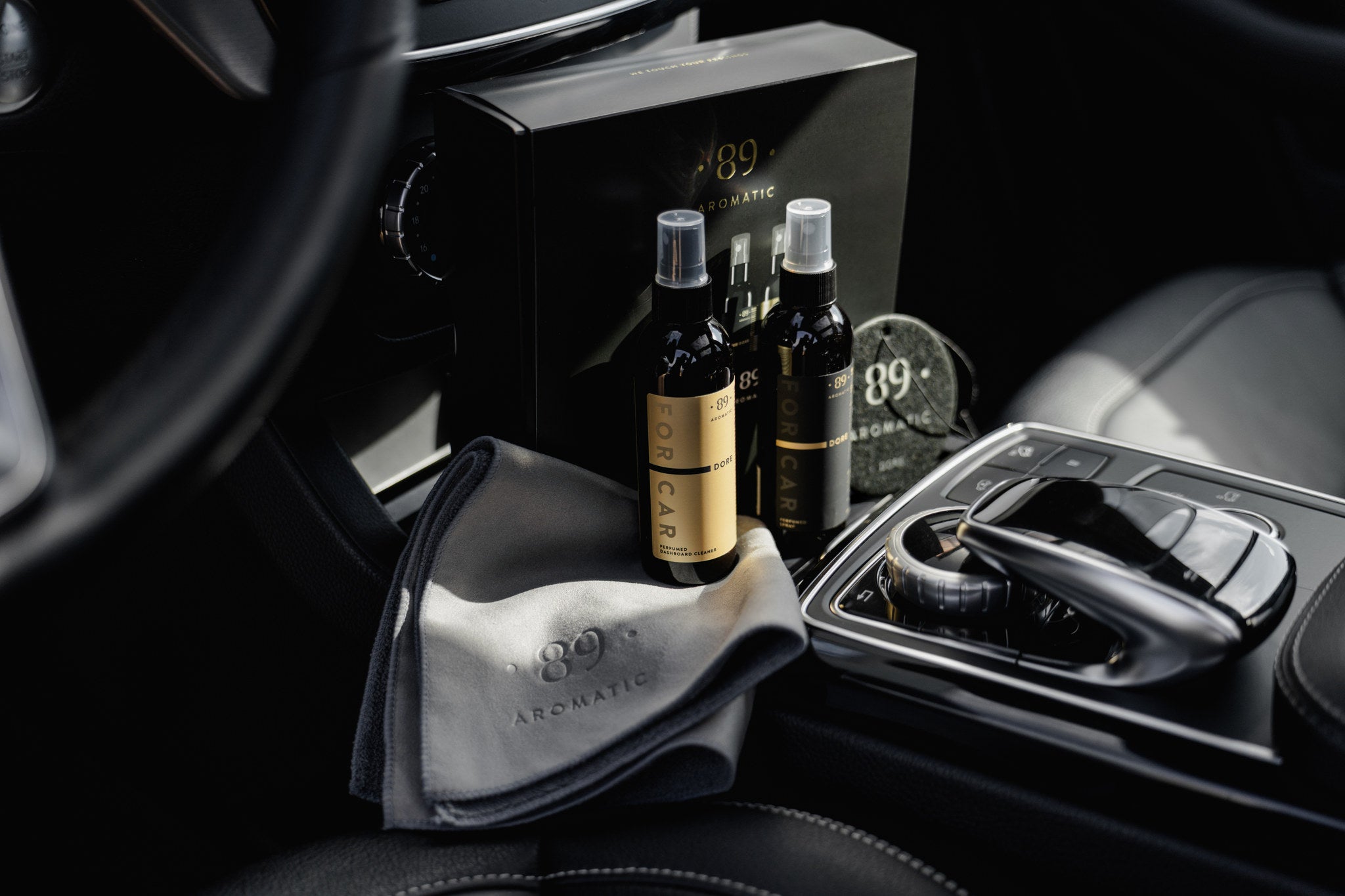 Aromatic 89 Car Care Set, set displayed on the centre console