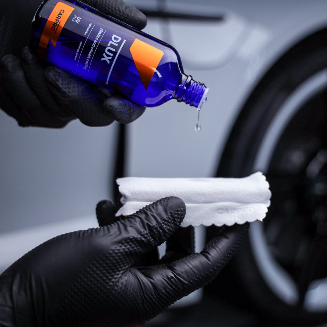 CarPro CQuartz DLUX being poured onto an applicator cloth