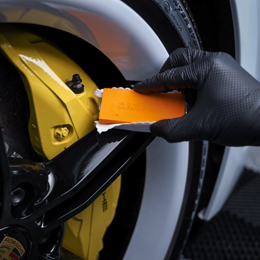 CarPro CQuartz DLUX being applied to a brake caliper