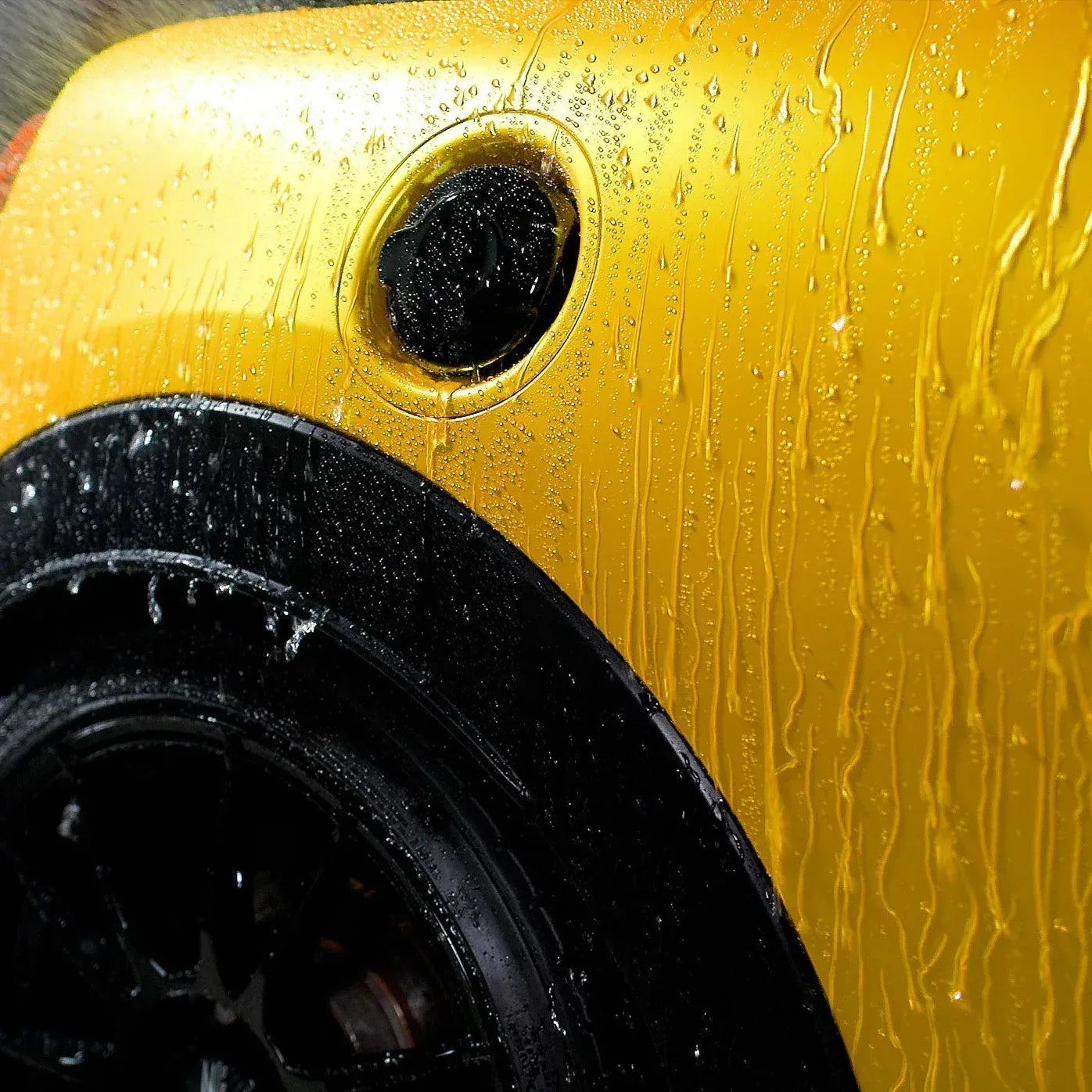 Gyeon Q² Matte EVO Light 50ml water beading on a matte yellow finish