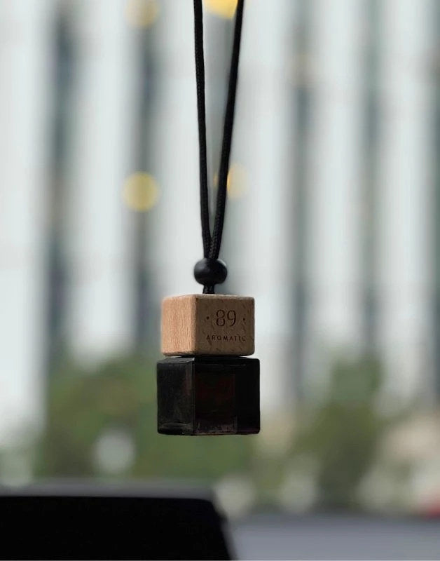 Aromatic 89 Hanging Glass Air Freshener 8ml, bottle hanging in the car