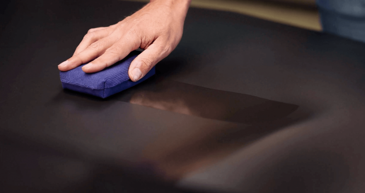 Gyeon Q² Matte EVO — coating applied to a matte black panel with a suede applicator