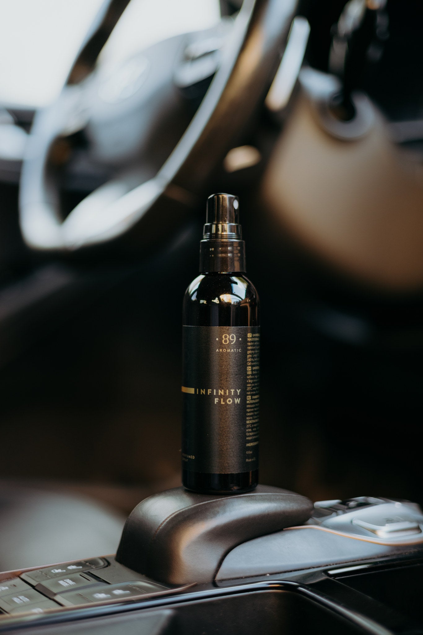 Aromatic 89 Car Perfume Spray 100ml, bottle on the gear selector