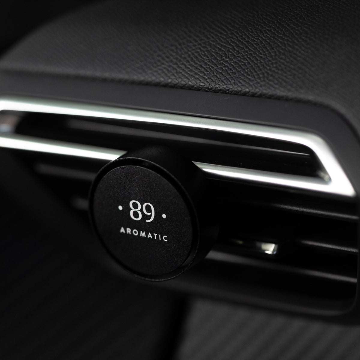 Aromatic 89 Car Air Freshener Vent Clip, clip fitted to an air vent