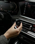 Aromatic 89 Car Air Freshener Vent Clip, fitting the clip in a BMW cabin